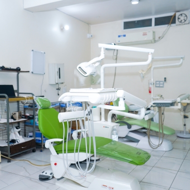 Instructor demonstrating oral implant placement technique