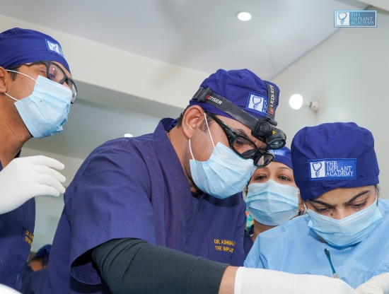 Live 360° dental implant placement in progress at The Implant Academy