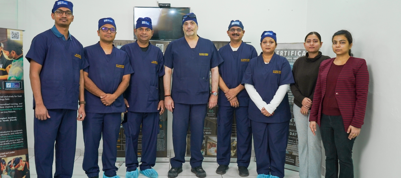 Instructor demonstrating dental implant placement technique